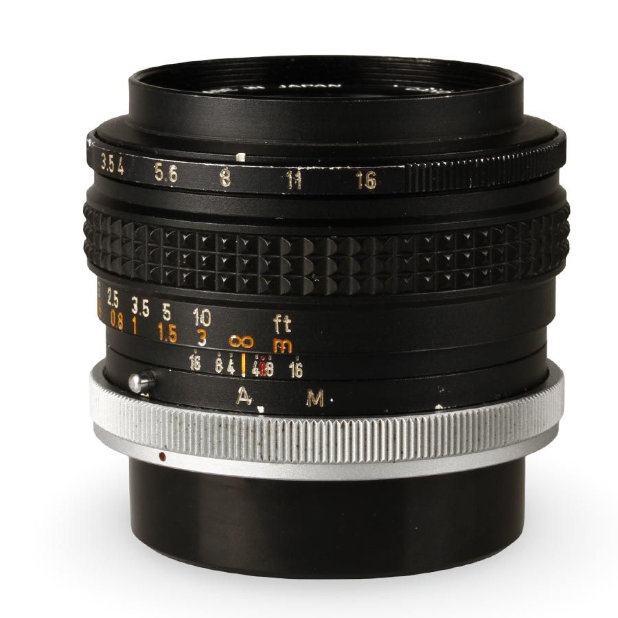 Câmera analógica 35mm Canon T90 com objetivas FL 50mm f1.8 + FL 35mm f3.5 - USADA