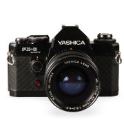 Câmera analógica 35mm Yashica FX-D com ML 42-75mm e flash - USADO